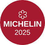Michelin logo with a flower symbol above the word and the year 2025 below, on a red circular background.