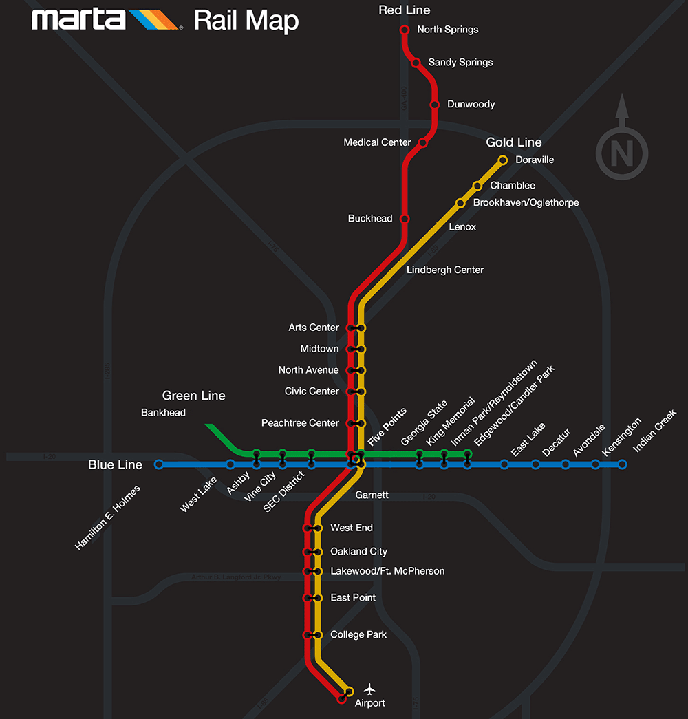 Atlanta transit rail map showing the Red, Gold, Green, and Blue lines with major stations and key venues including Mercedes Benz Stadium, State Farm Arena, Centennial Olympic Park, and Georgia World Congress Center.